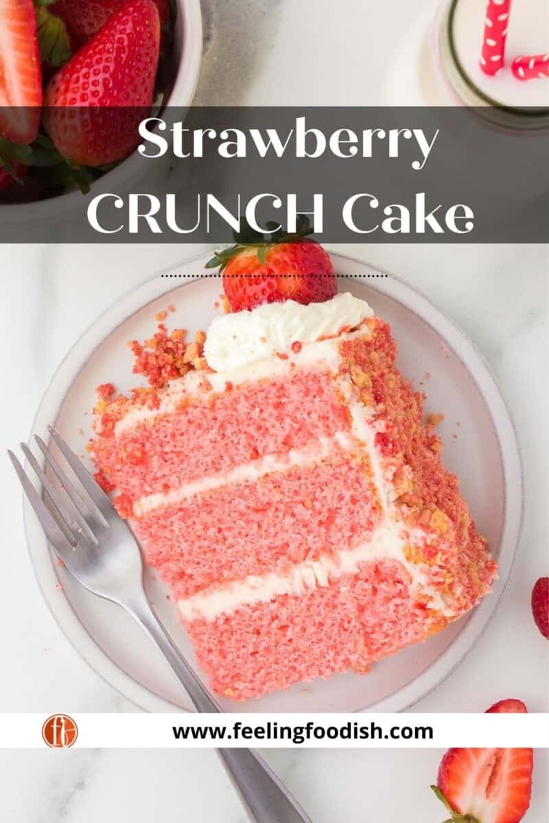 slice of strawberry crunch cake with fork on white background