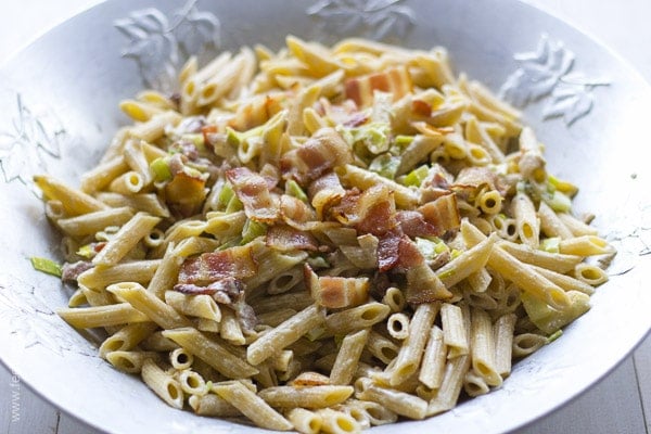 Bacon and cheese pasta in silver bowl