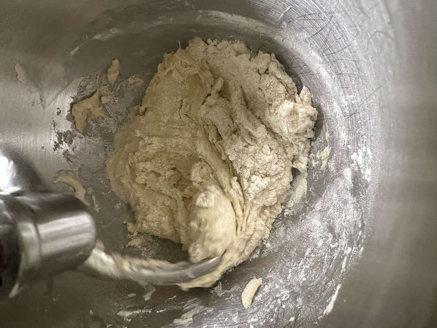 dough being mixed in standing mixer 