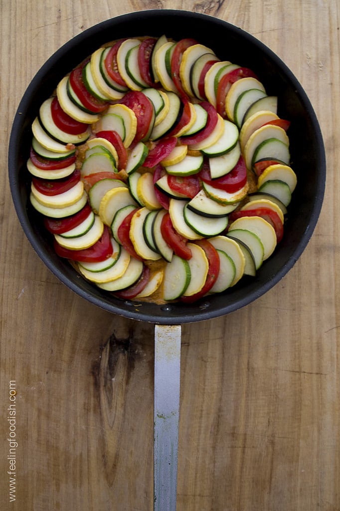 frying pan of sliced vegetables for ratatouille 