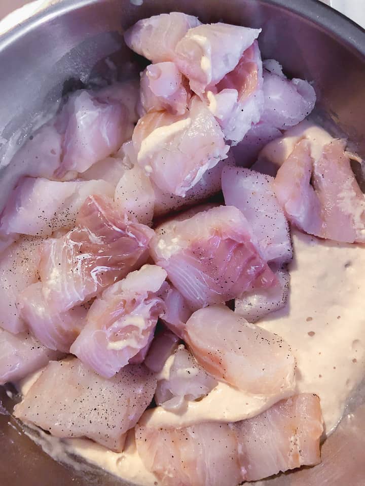 pieces of fish in batter to be mixed and fried