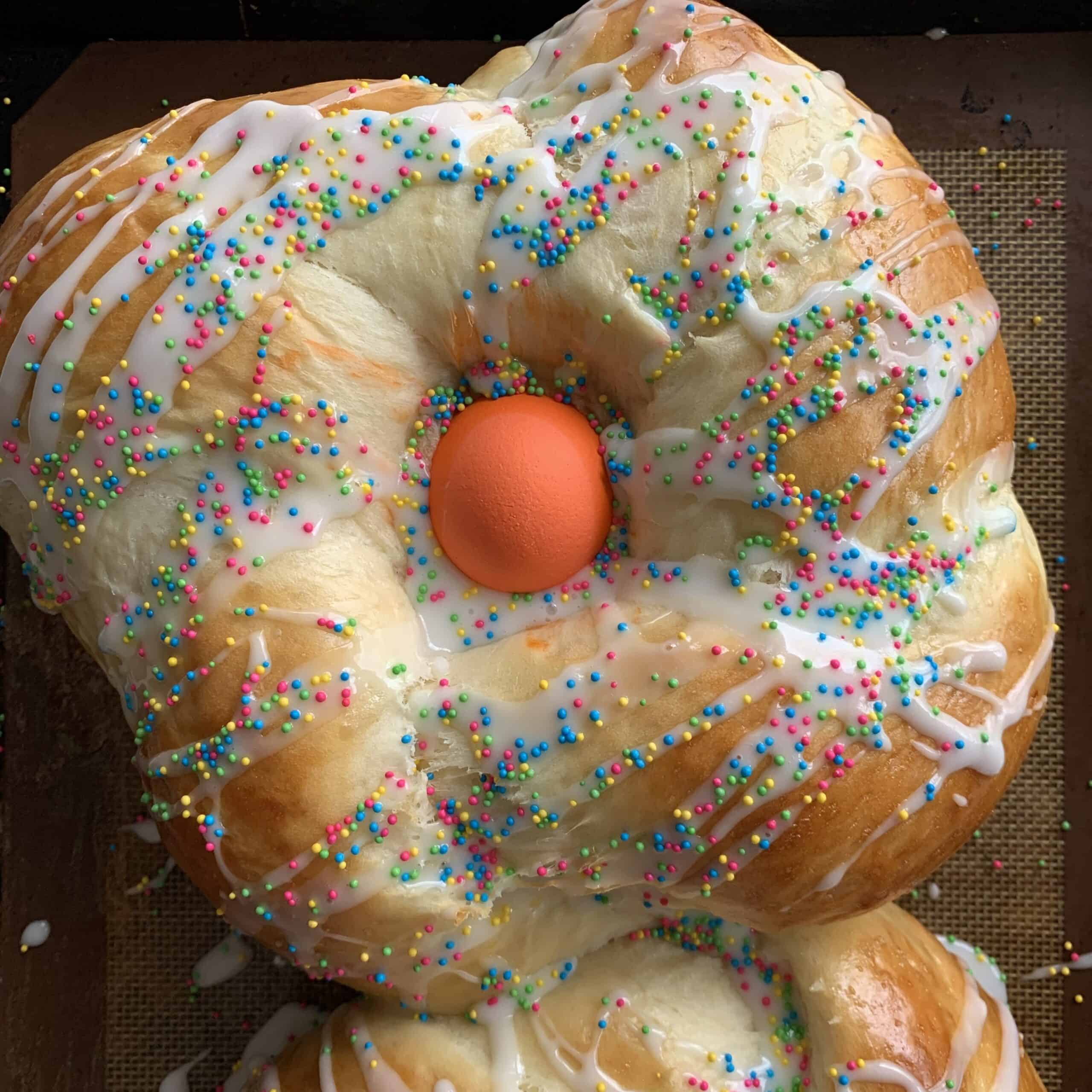 top view of easter bread with orange egg