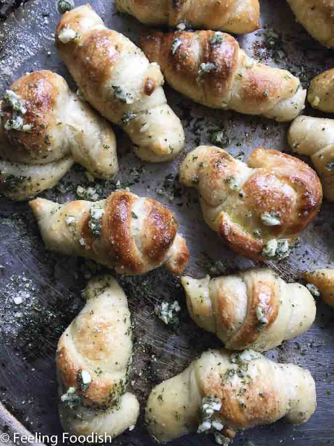 Use pizza dough to make these garlic knots that are loaded with garlic,