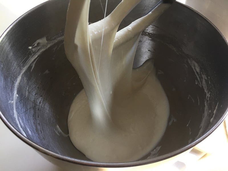 pizza dough in bowl as seen looks almost like batter and ends up as a very very wet dough