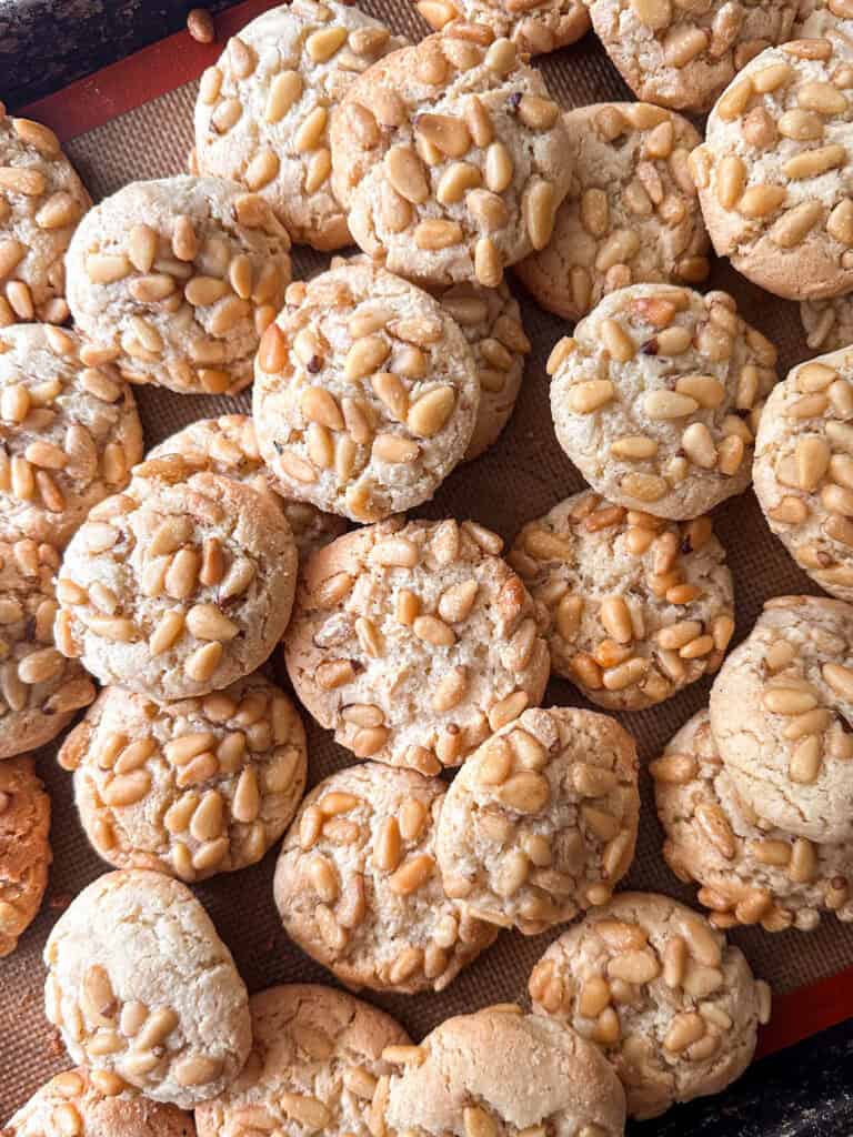 Top view of baked pignoli cookies.