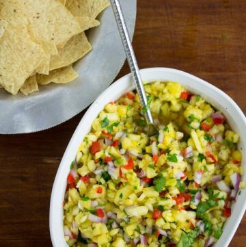 dish of pineapple salsa with chips