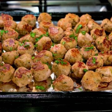 baked turkey meatballs on tray on stovetop