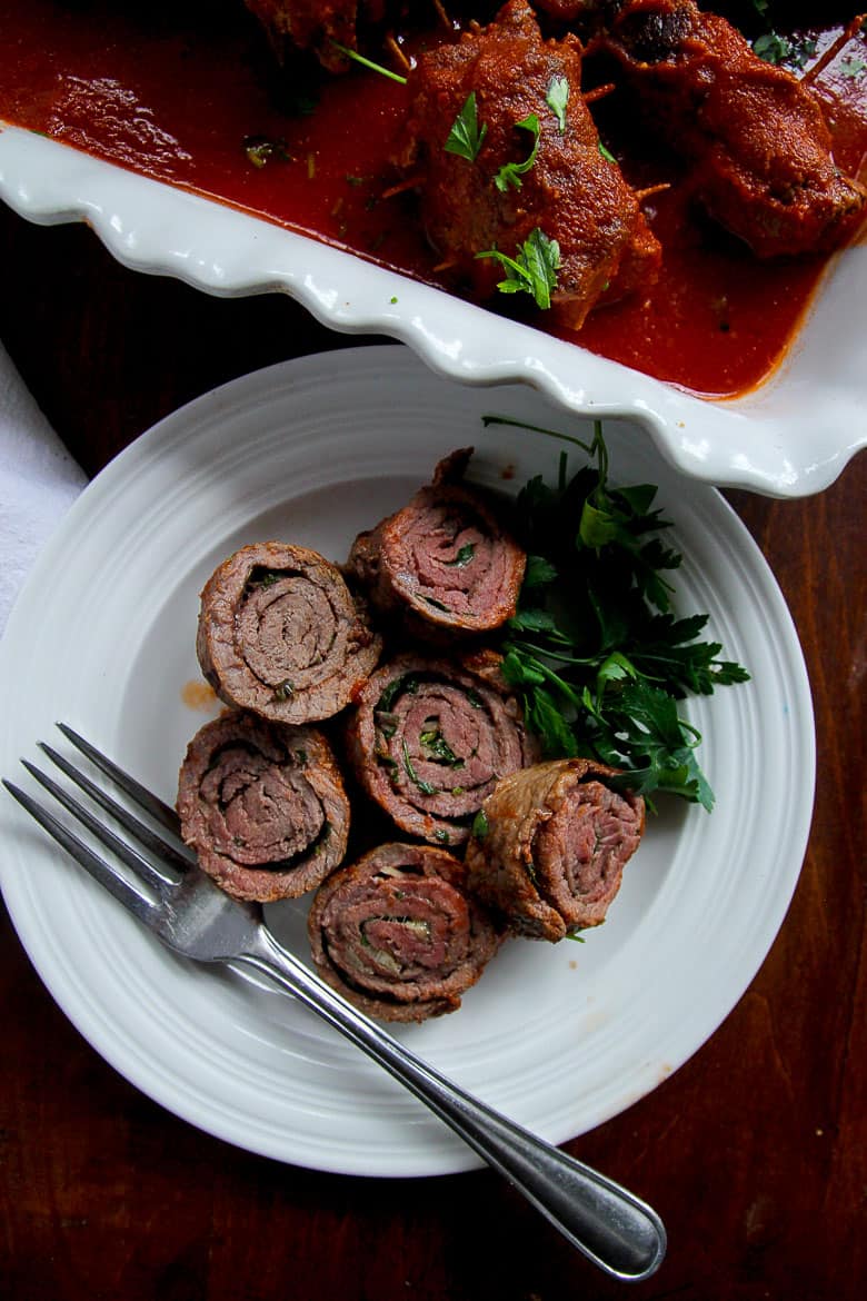 sliced Italian beef braciole in dish