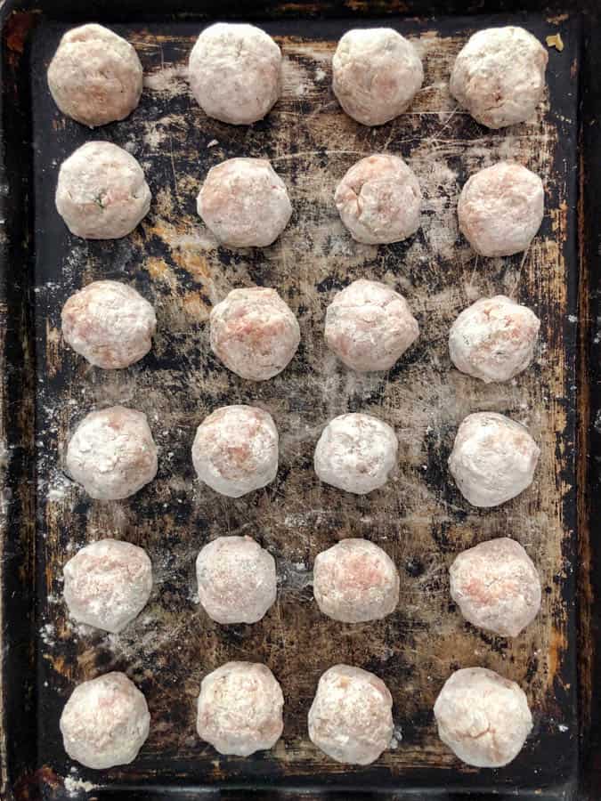 tray of italian turkey meatballs about to be baked
