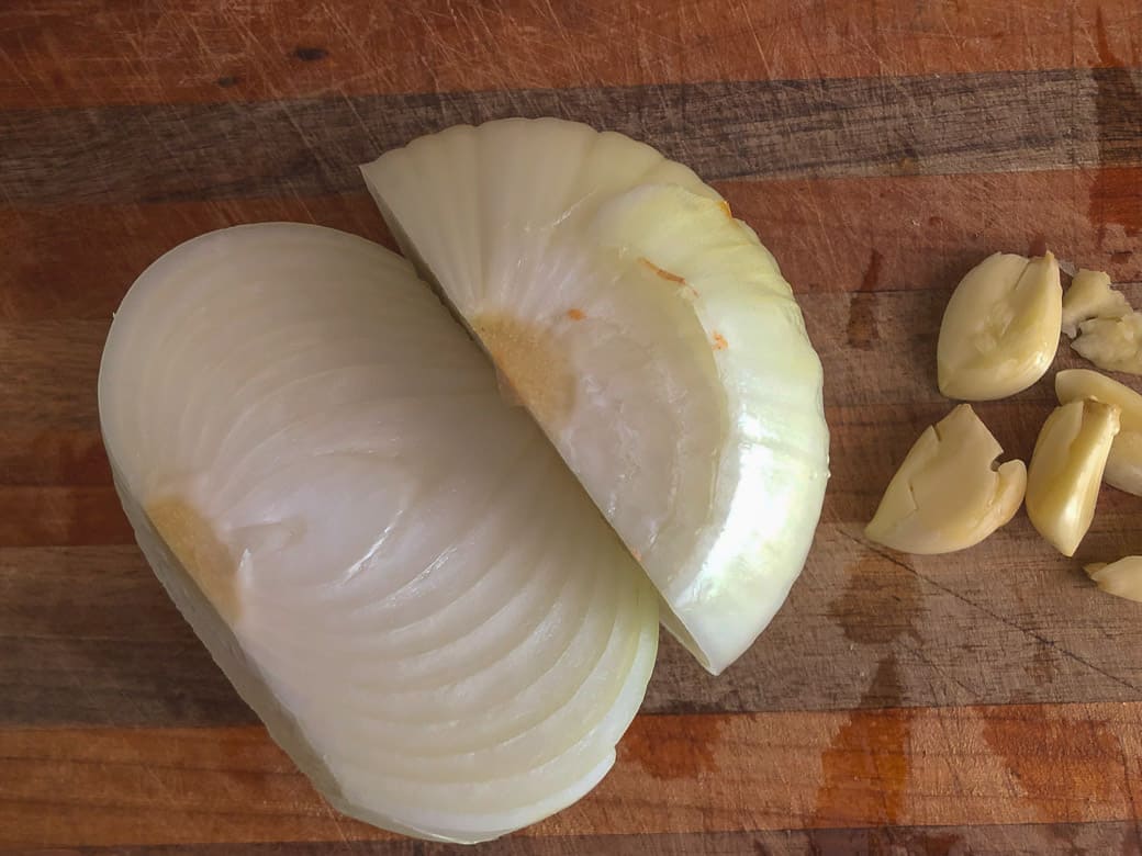 chopped onion and peeled garlic