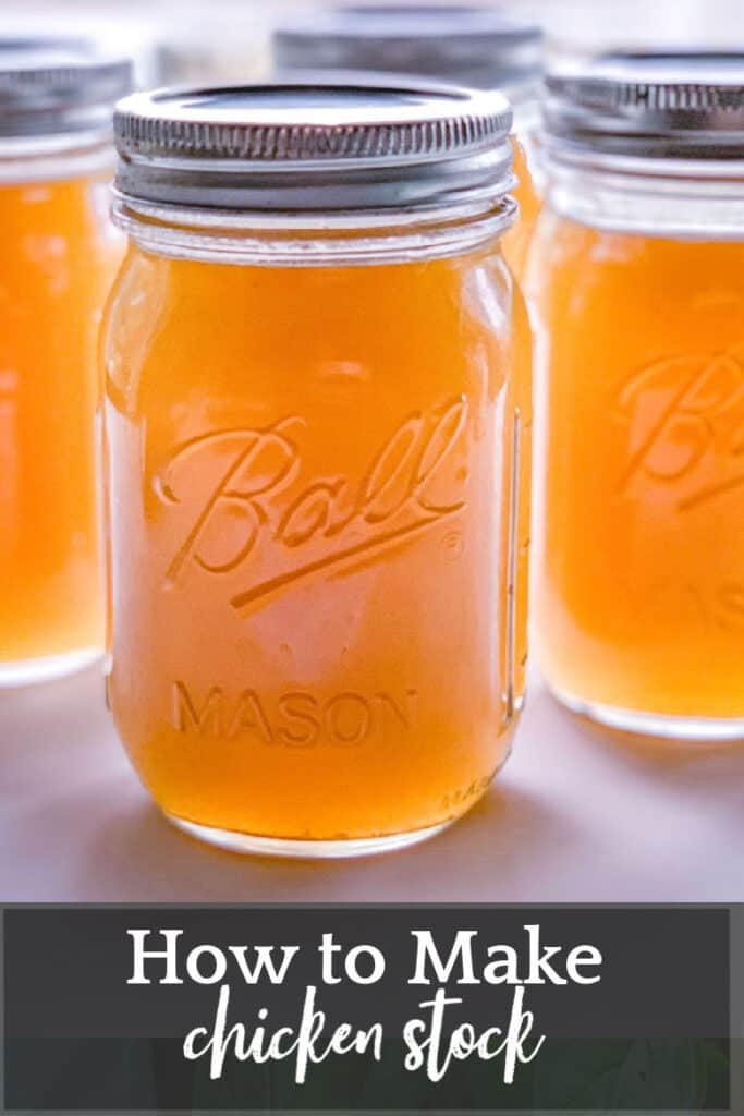 front view of four pint size glass ball jars filled with fresh chicken stock