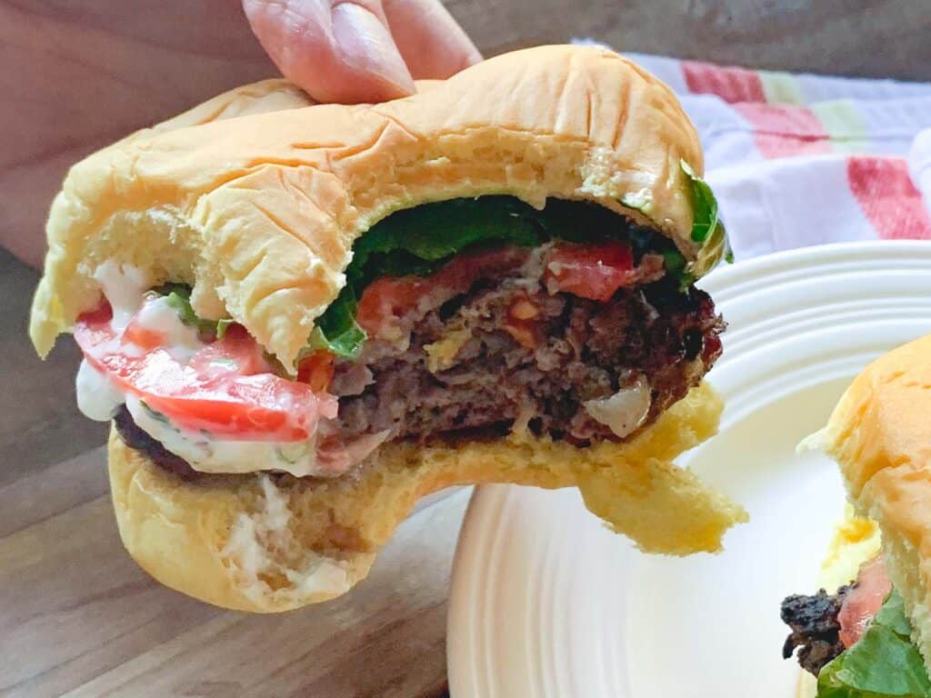 Gryo burger with bite taken out