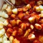 close up view of ricotta gnocchi with tomato sauce