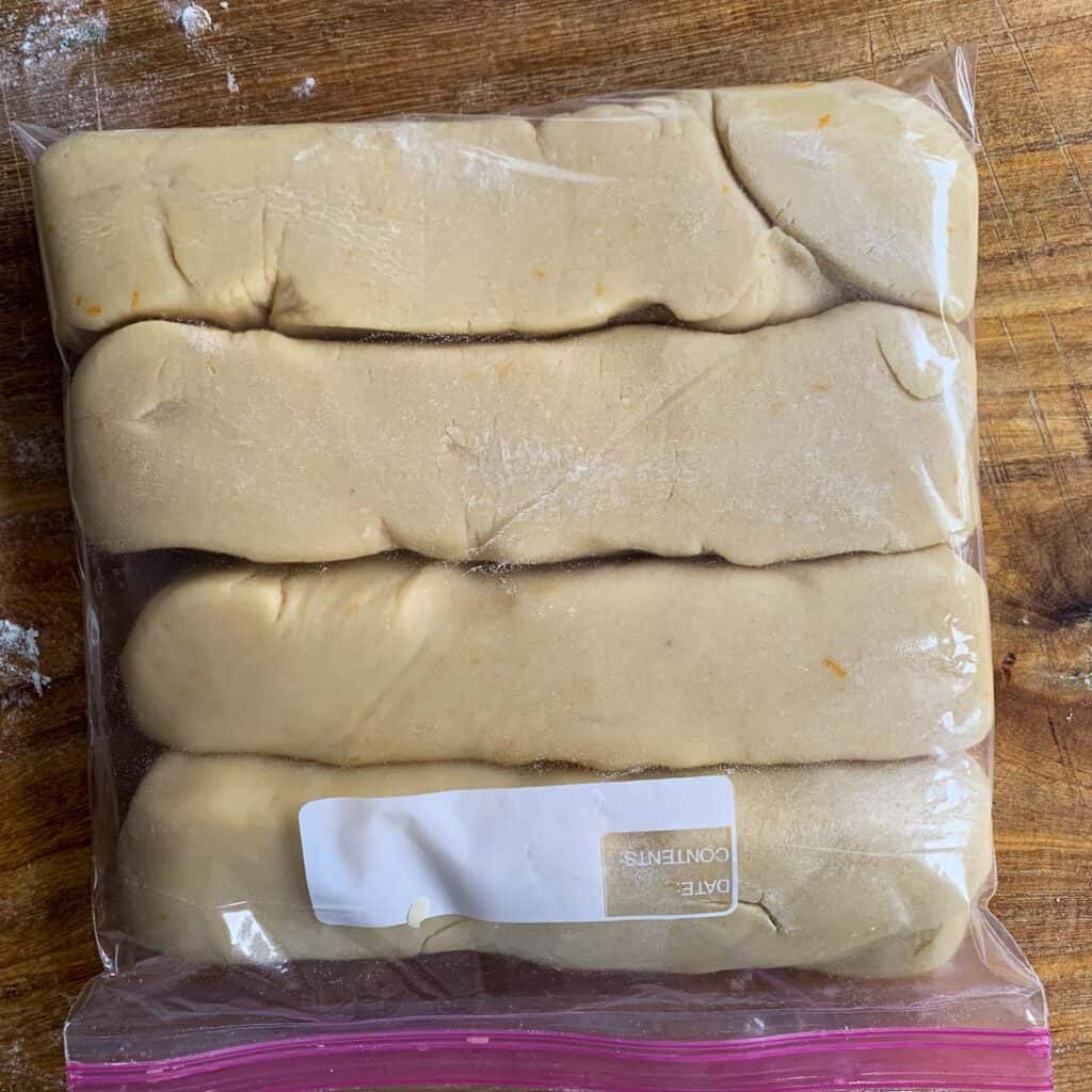 logs of cookie dough in plastic wrap