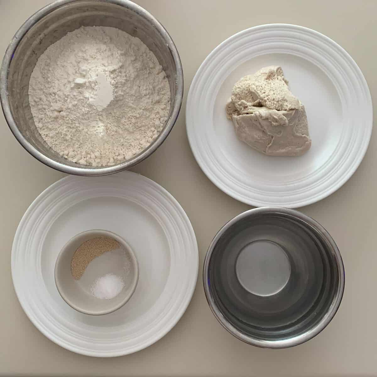 Bialys dough ingredients shown in bowls