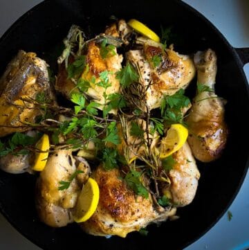 top view of Italian skillet roasted chicken with lemon and wine