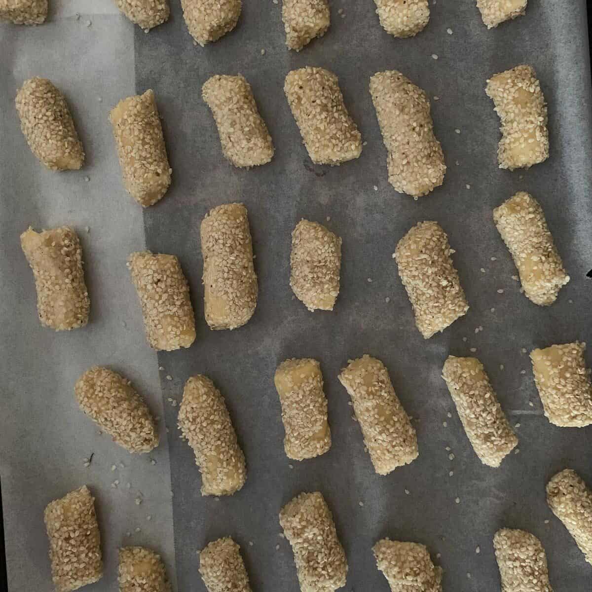 unbaked cookies on parchment lined baking sheet