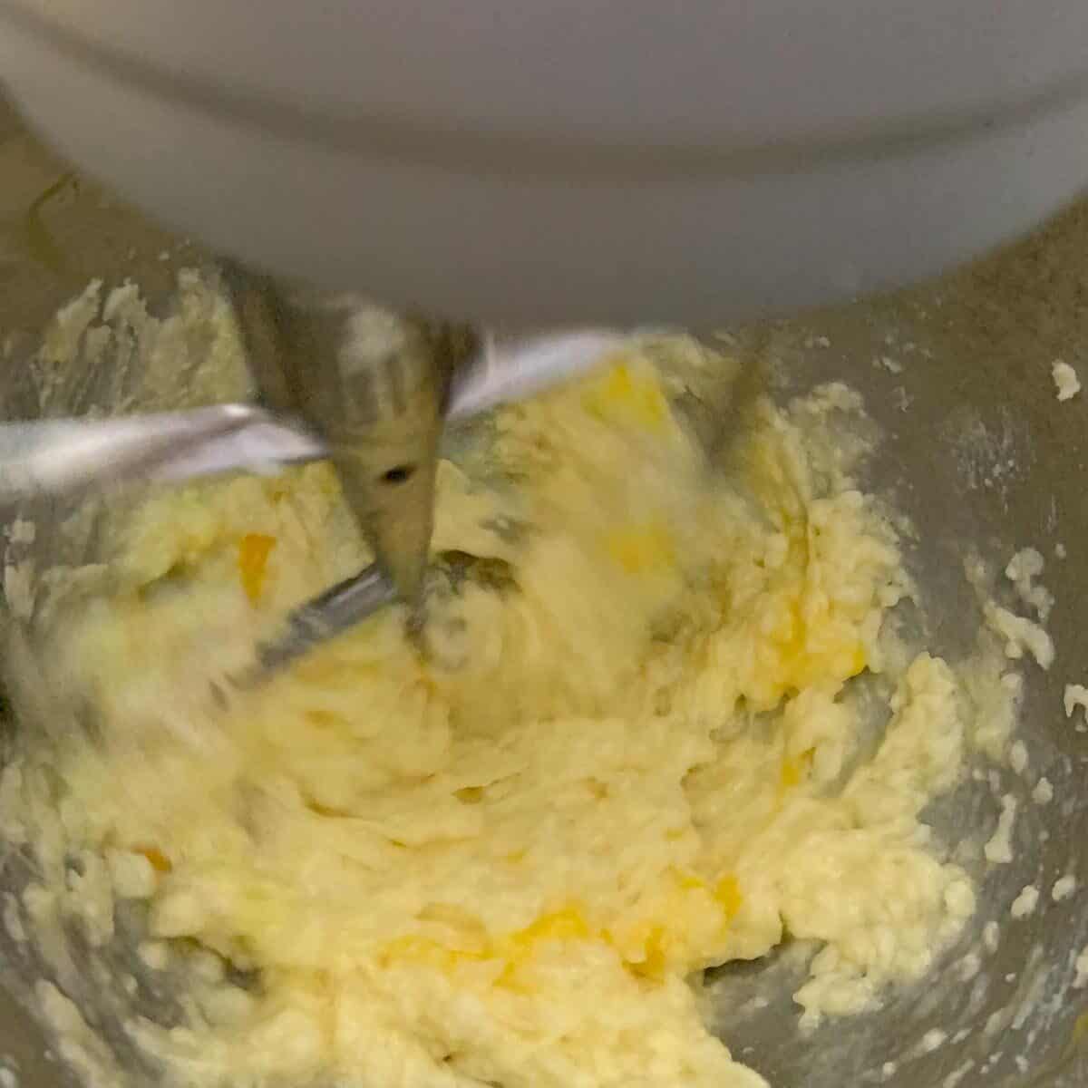 close up of dough after adding egg to sesame cookie dough