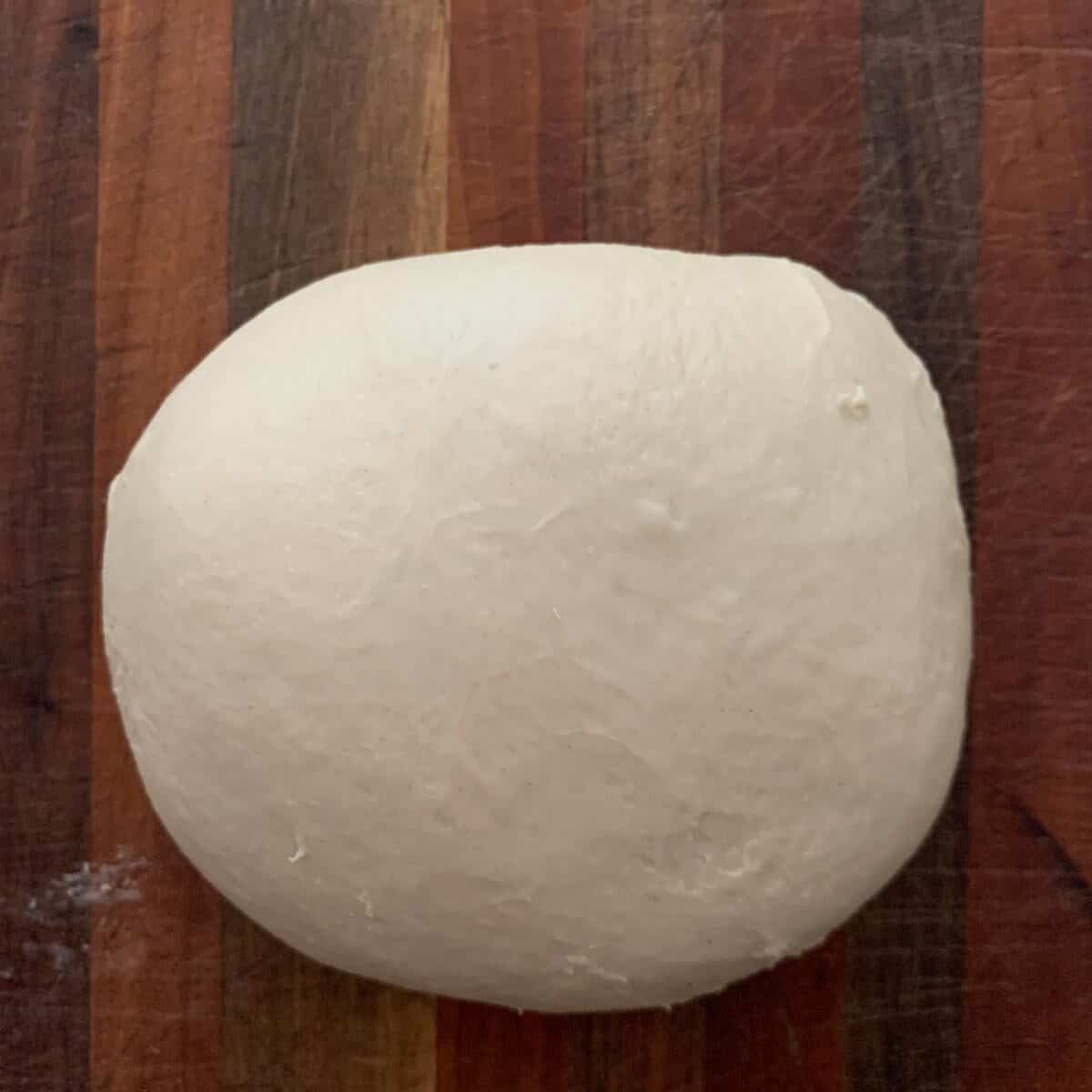 dough ball on wooden background