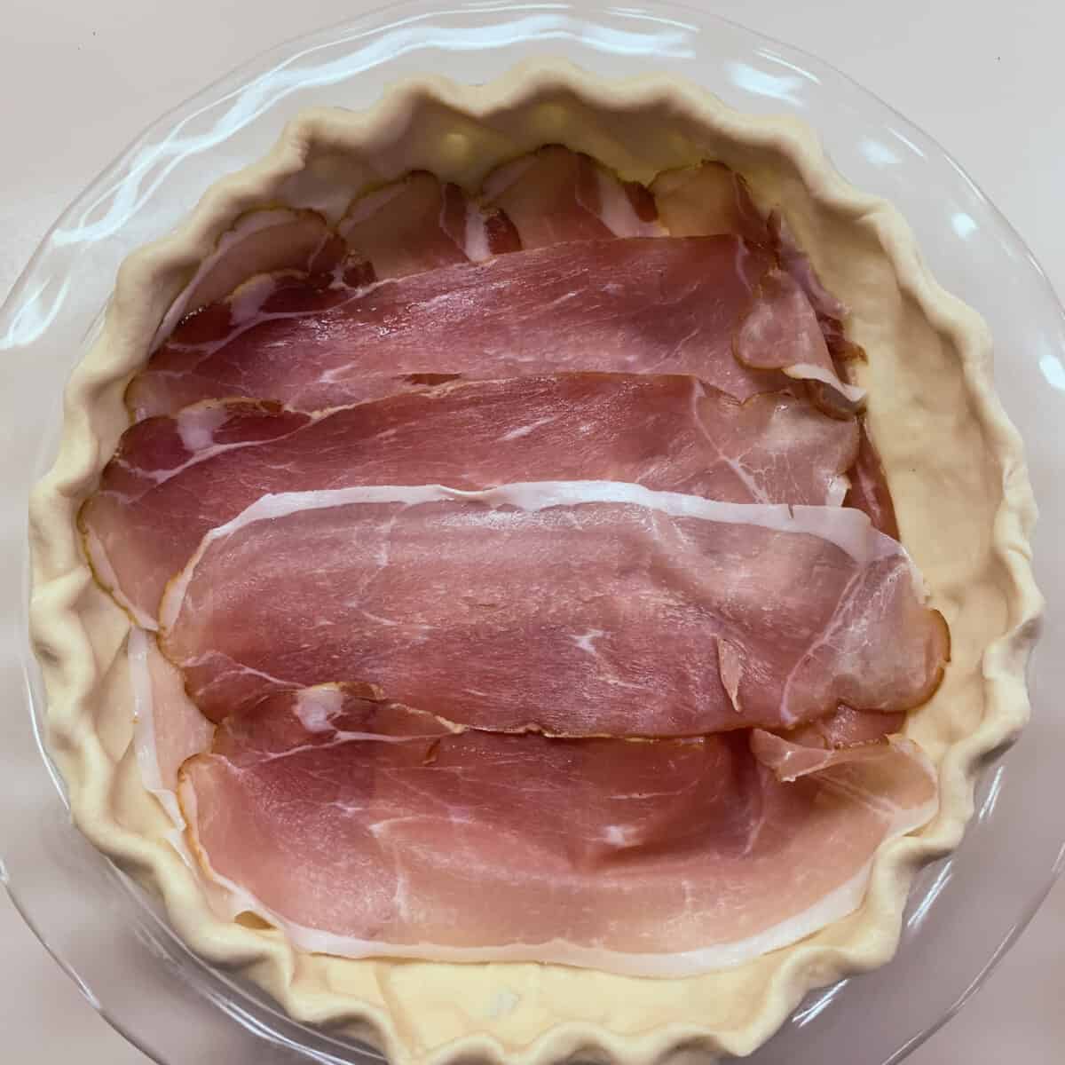 first layer of meat in unbaked pie