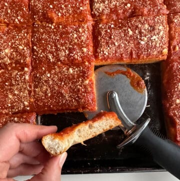 close up of side of tomato pie slice showing thickness