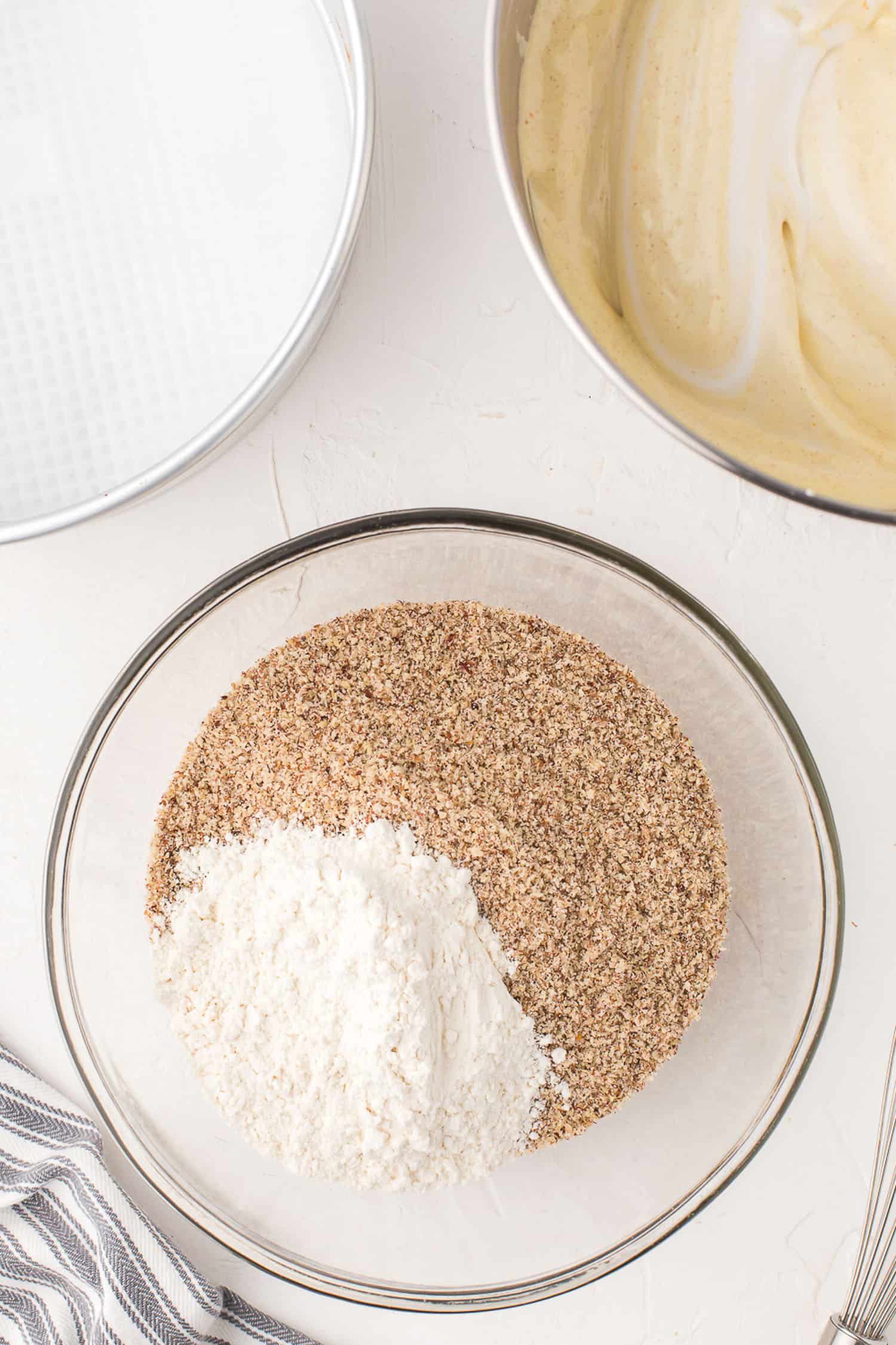 adding all purpose flour to hazelnut flour