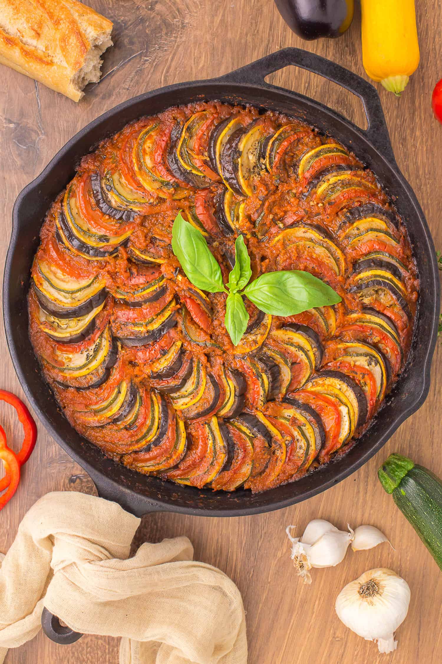 top view of cooked ratatouille on wooden background 