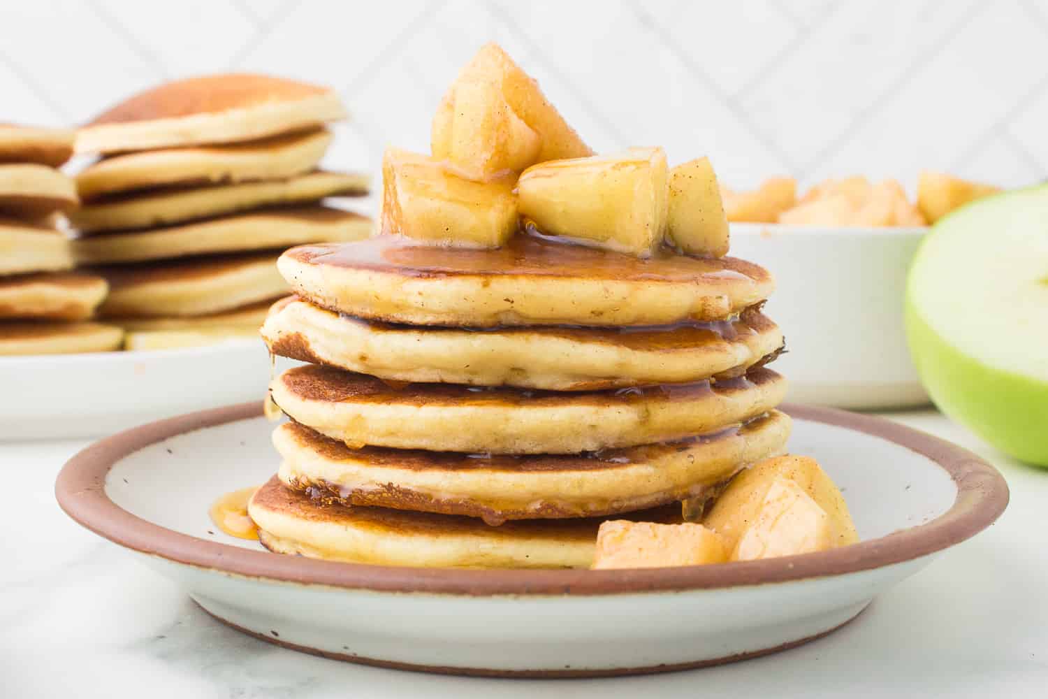 side view of lemon ricotta pancake stack