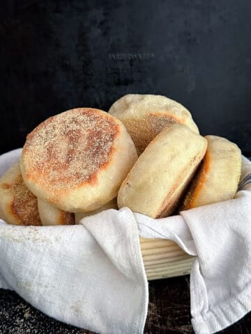 basked lined with white cloth and filled with english muffins