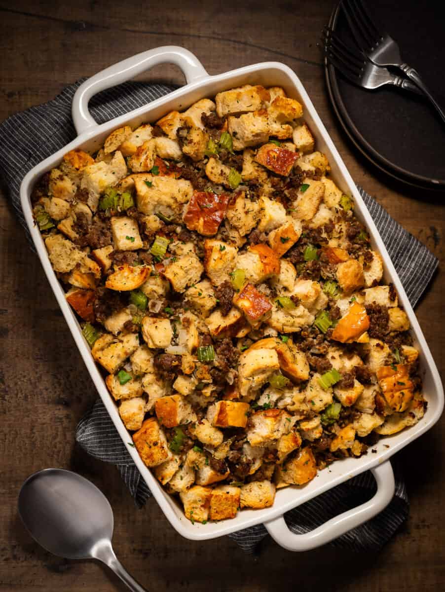 Italian sausage stuffing on wooden background.