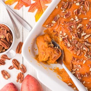 Sweet potato casserole with nuts on white board