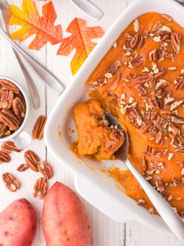 Sweet potato casserole with nuts on white board