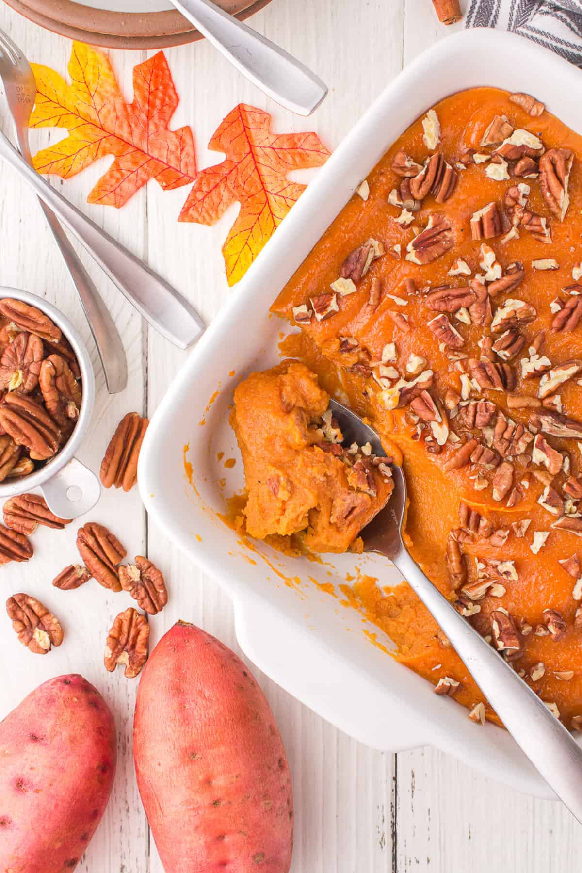 Sweet potato casserole with nuts on white board