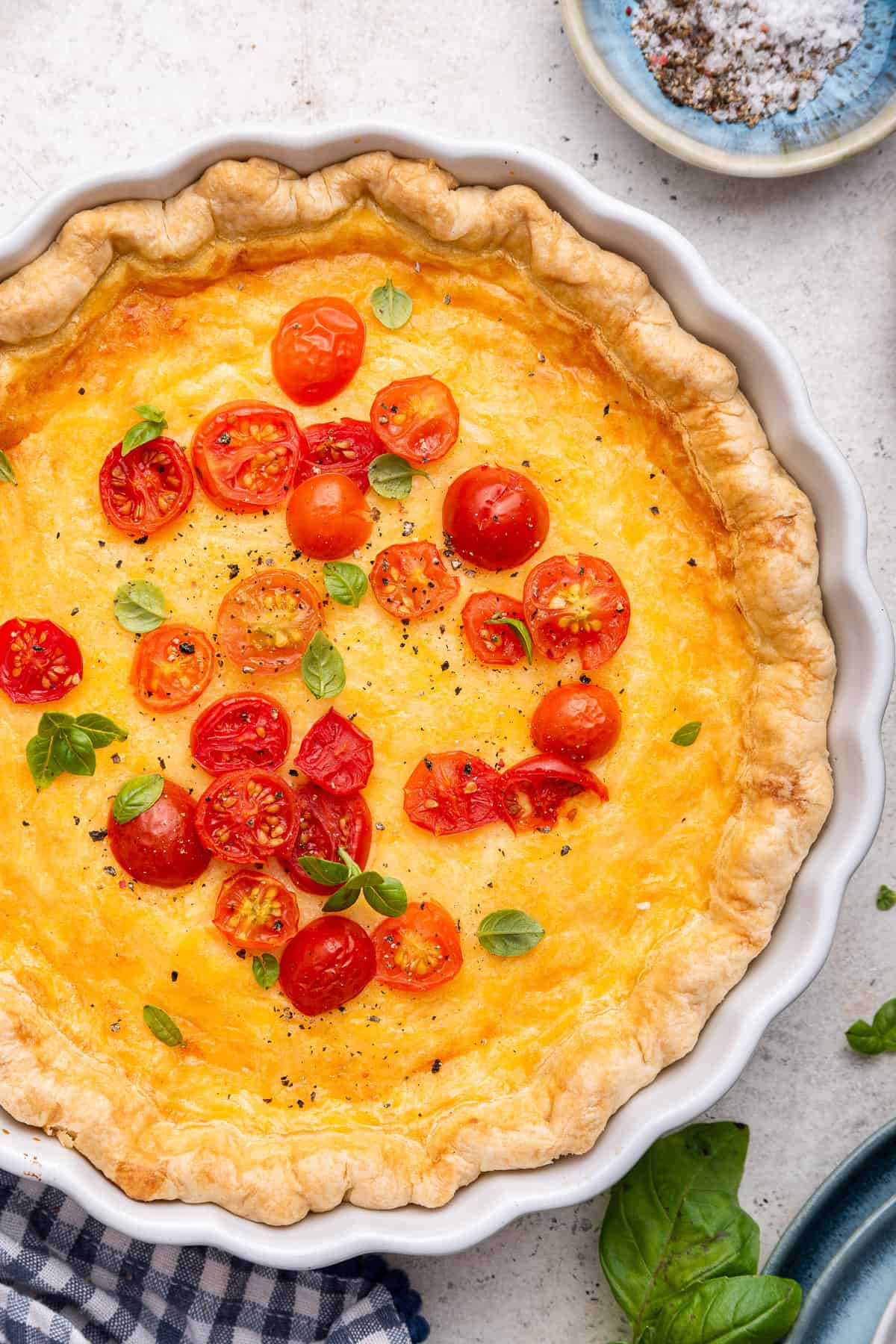 top view of easy quiche with tomato on top
