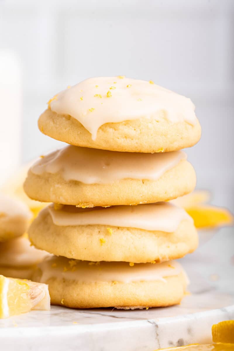 A single stack of lemon ricotta cookies with lemon frosting.