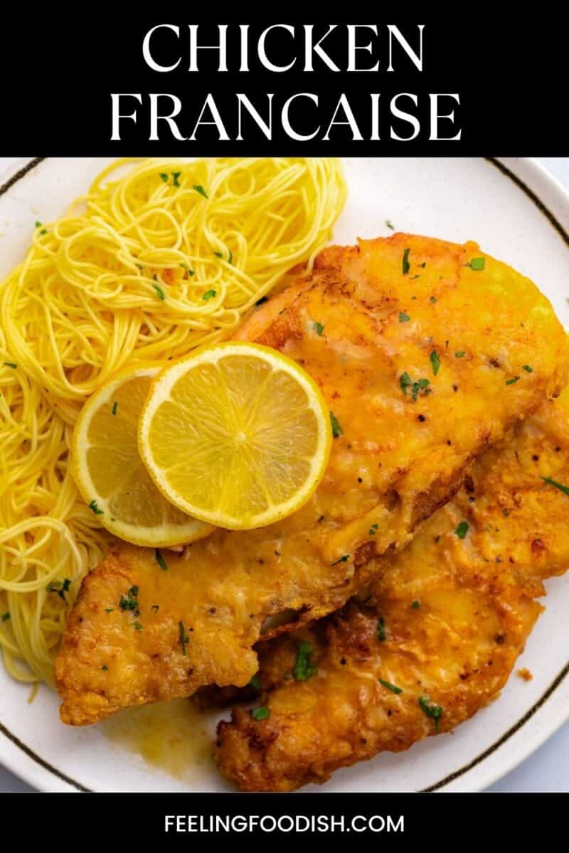 Plate of chicken francaise with spaghetti.