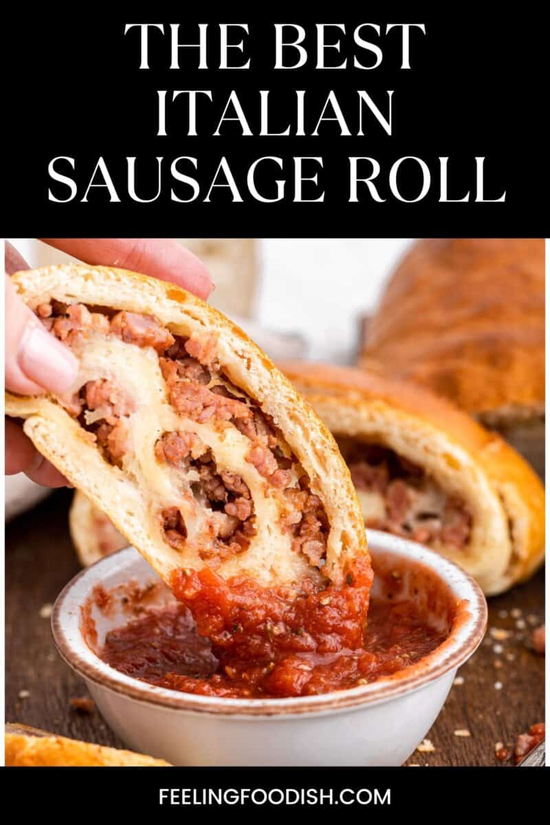 Slice of sausage bread being dipped into pizza sauce.
