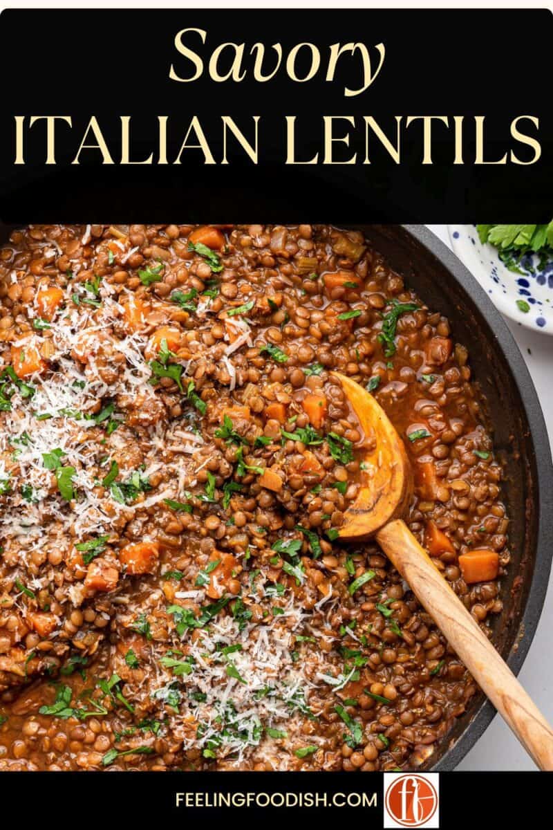 Italian lentils with wooden spoon in pan.