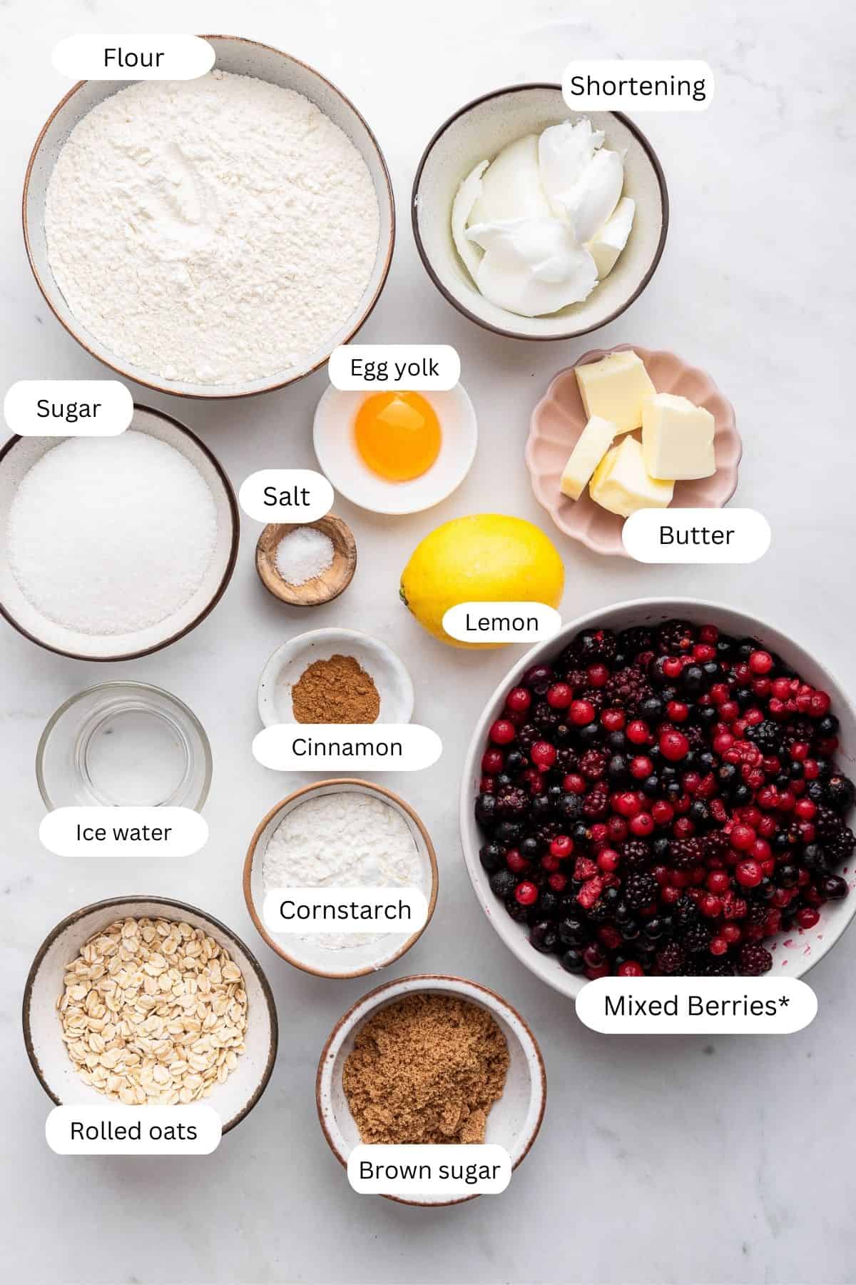 Ingredients for the mixed berry pie (pie dough, filling, and topping). 