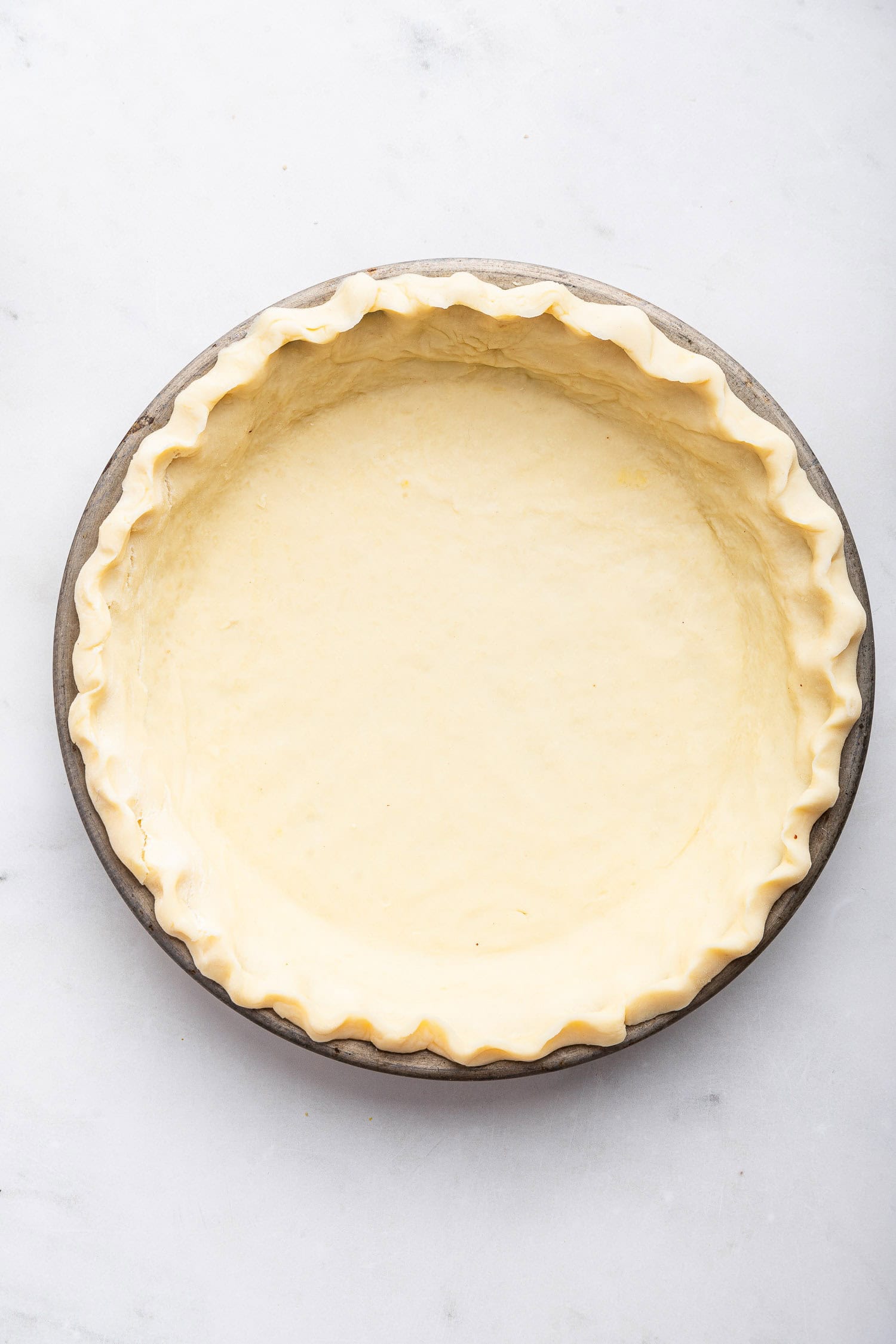 Unbaked pie crust.