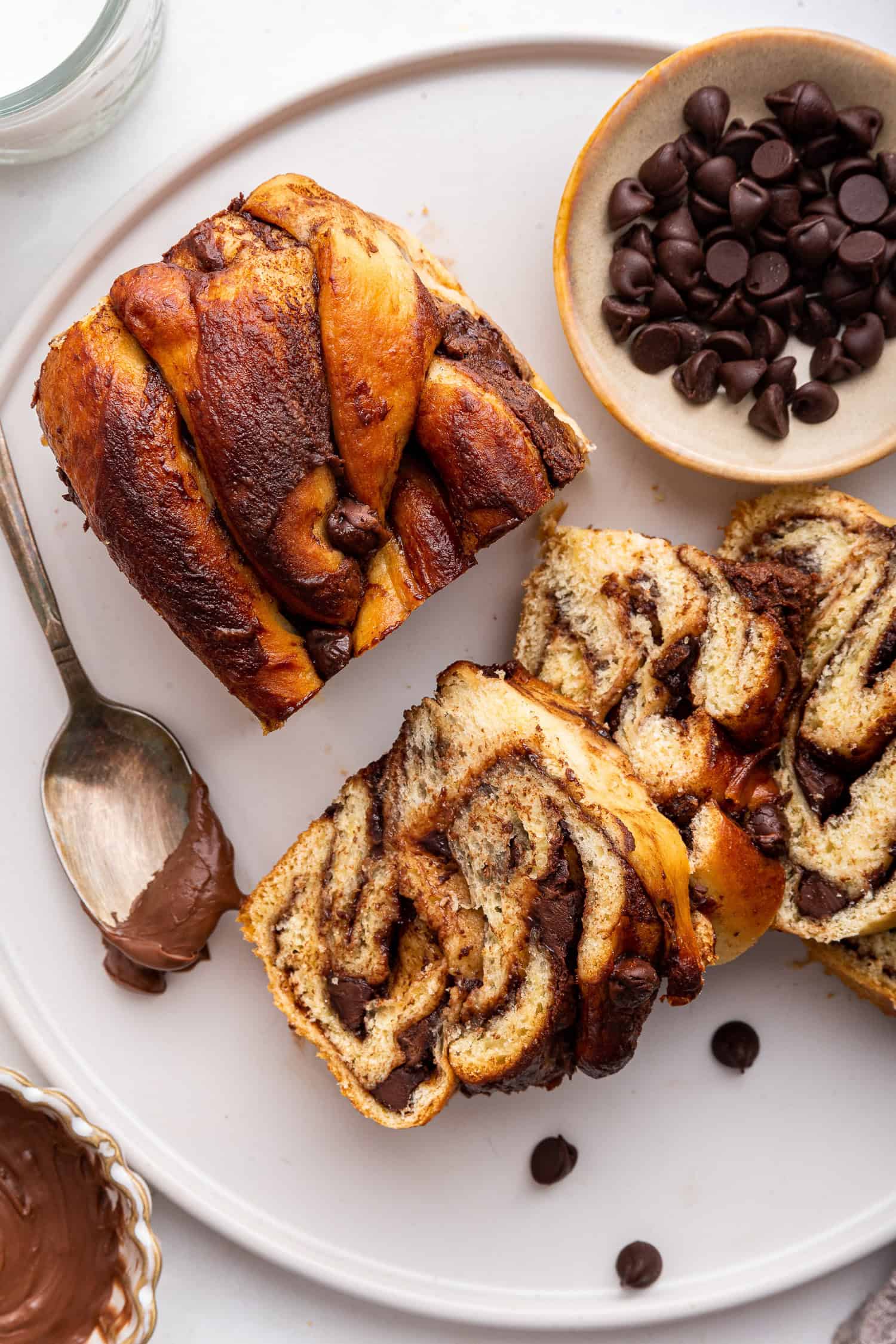 Slices of chocolate babka on white plate.