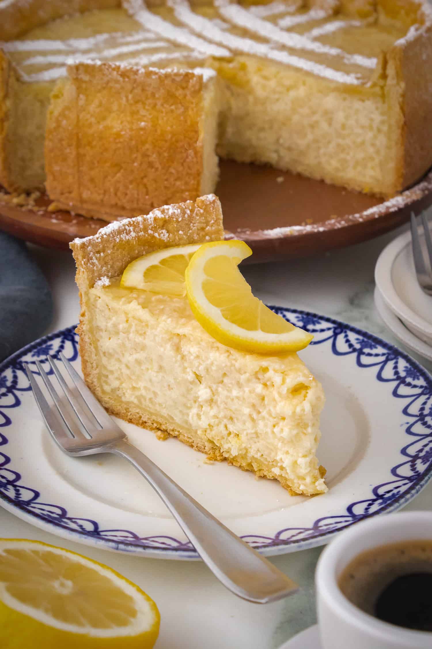 slice rice pie on blue and white dish.