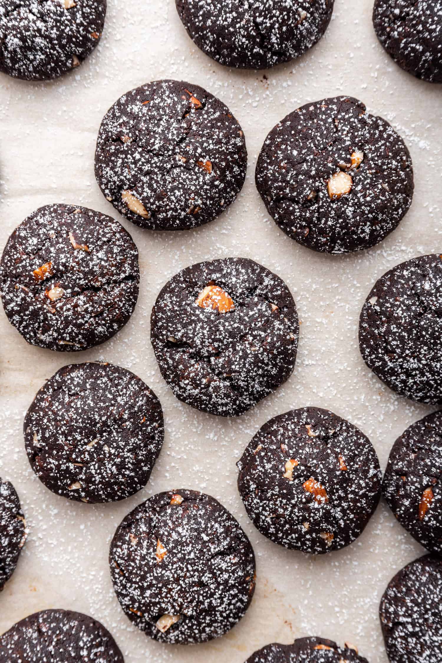 pan of chocolate orange cookies with powdered sugar. 