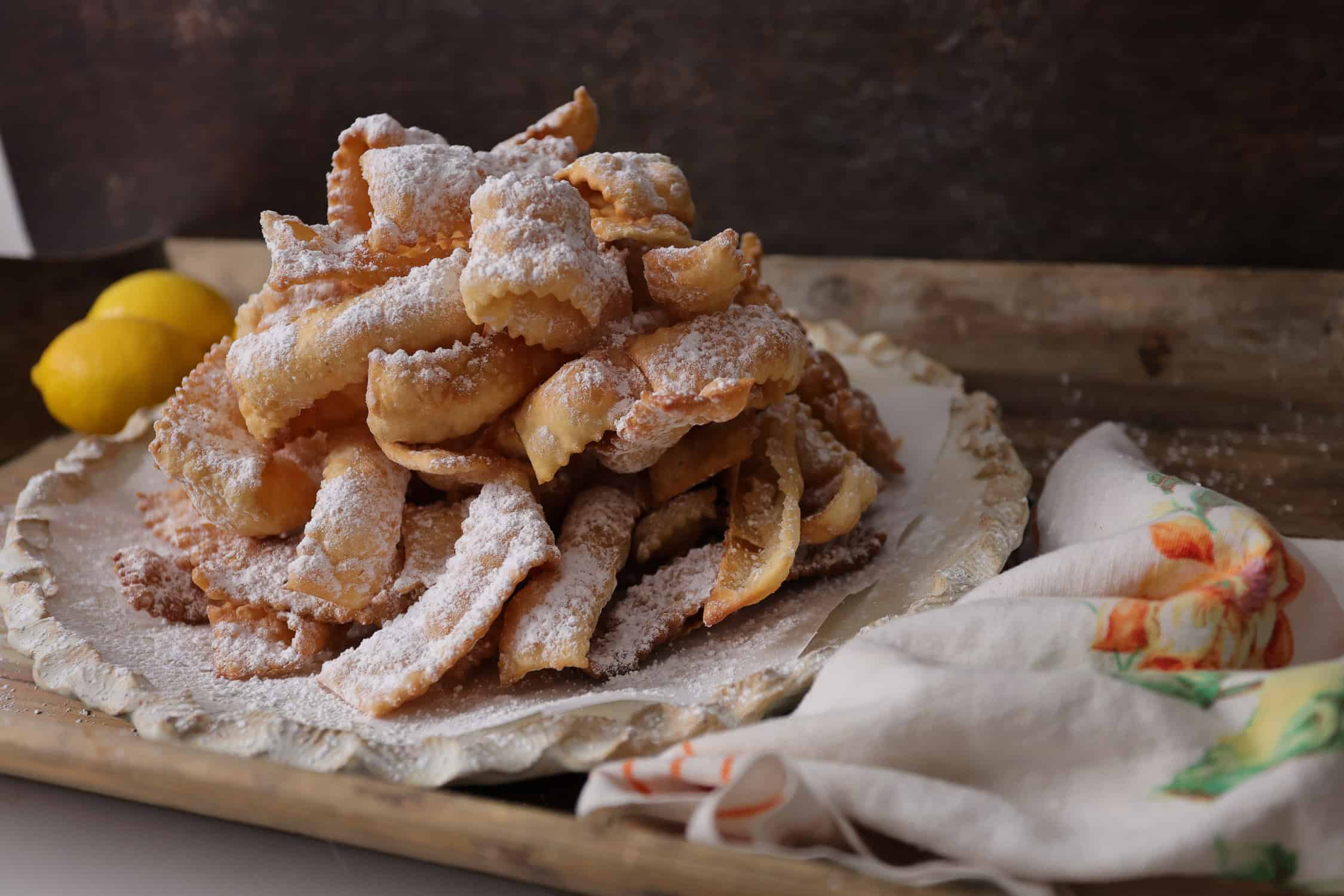 Dish of crostoli on white plate. 