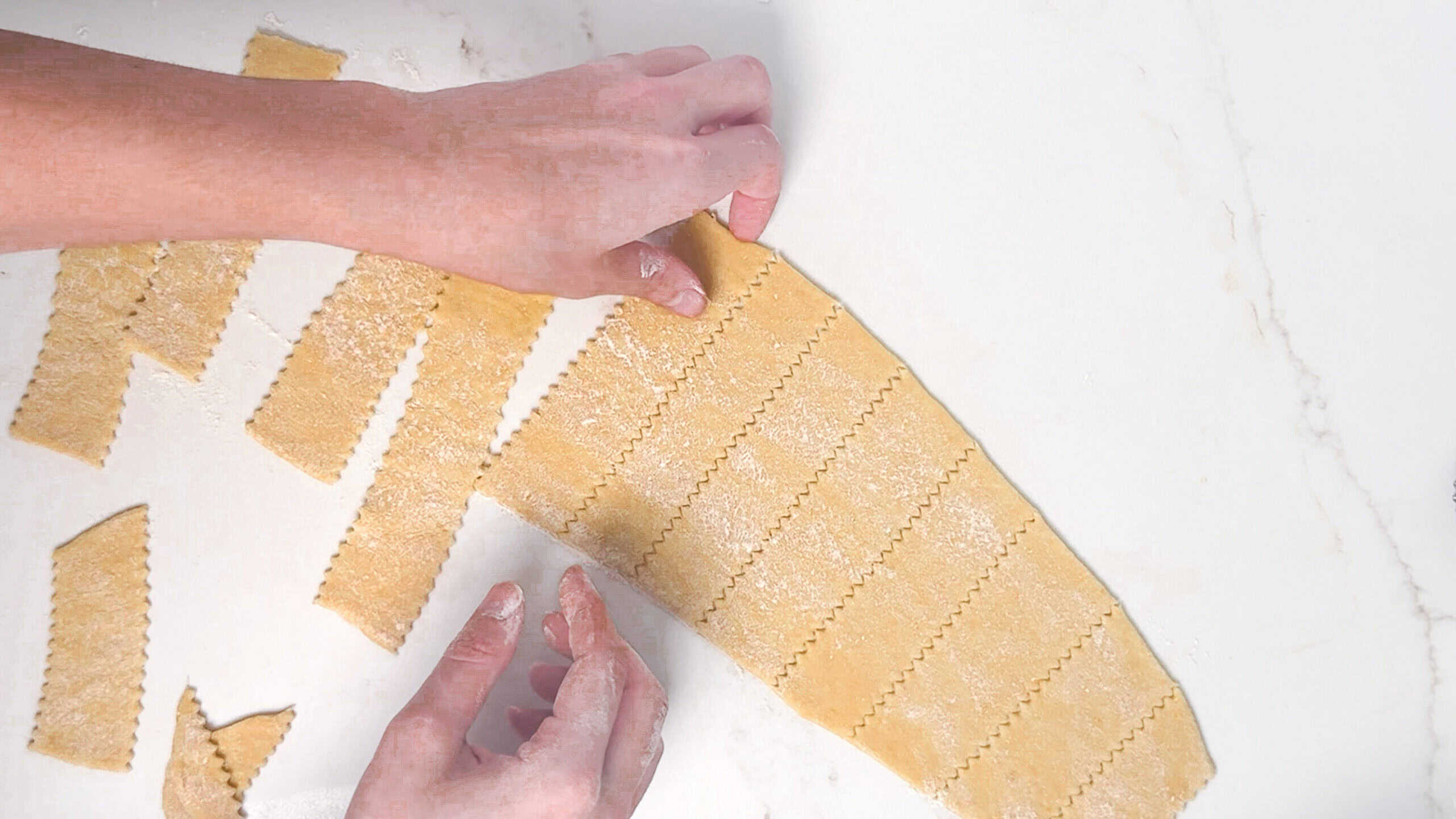 Dough rolled thin and cut into strips. 