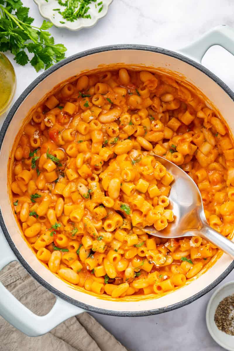 Creamy pasta e fagioli in big pot.