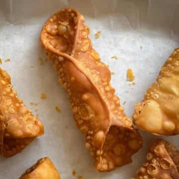 cannoli shell empty on parchment.