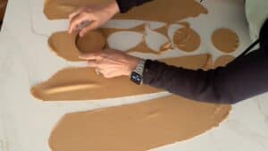 Cutting dough into circles.