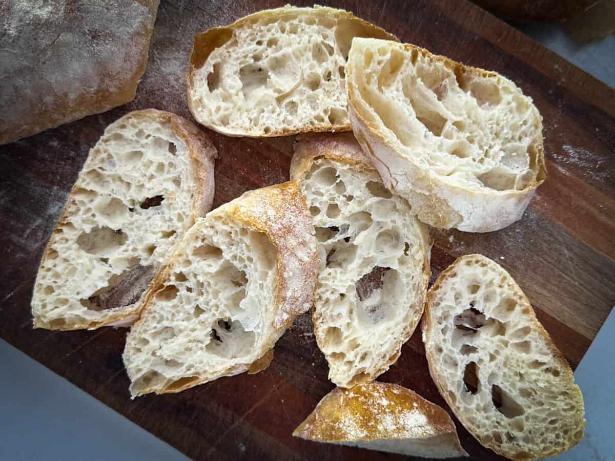 A loaf of bread on a cutting board.