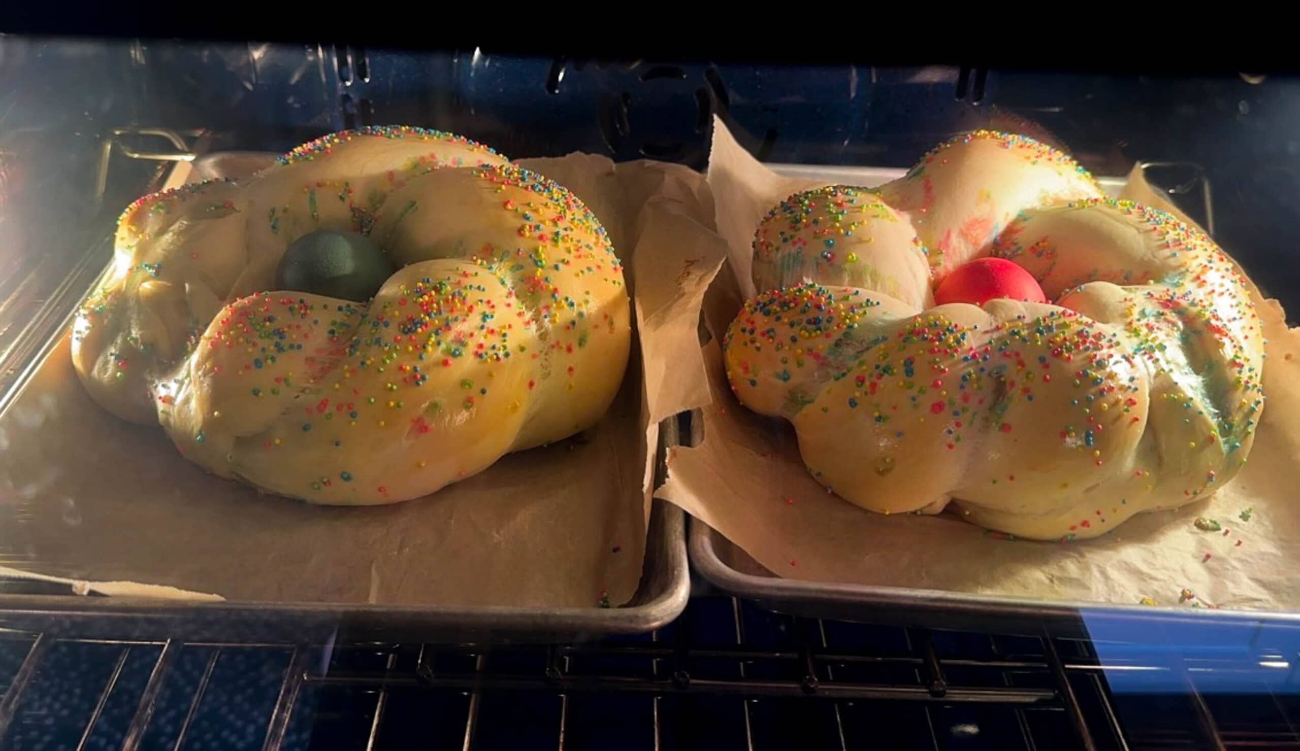 Loaves in oven near end of baking.